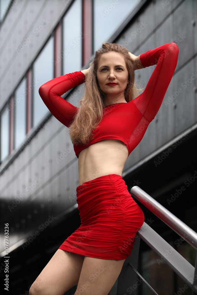 young woman in red top and skirt young woman in red top and skirt
