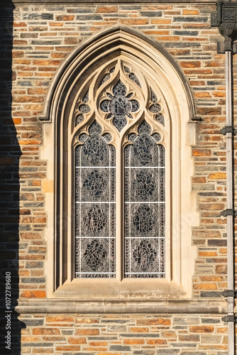 Window and tracery. Collegiate Gothic architecture style.