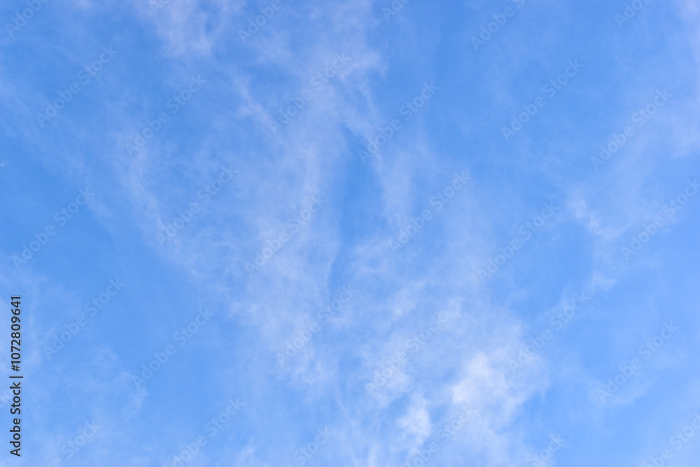 beautiful blue sky and white fluffy group of clouds with sunrise in the morning, natural background beautiful blue sky and white fluffy group of clouds with sunrise in the morning, natural background