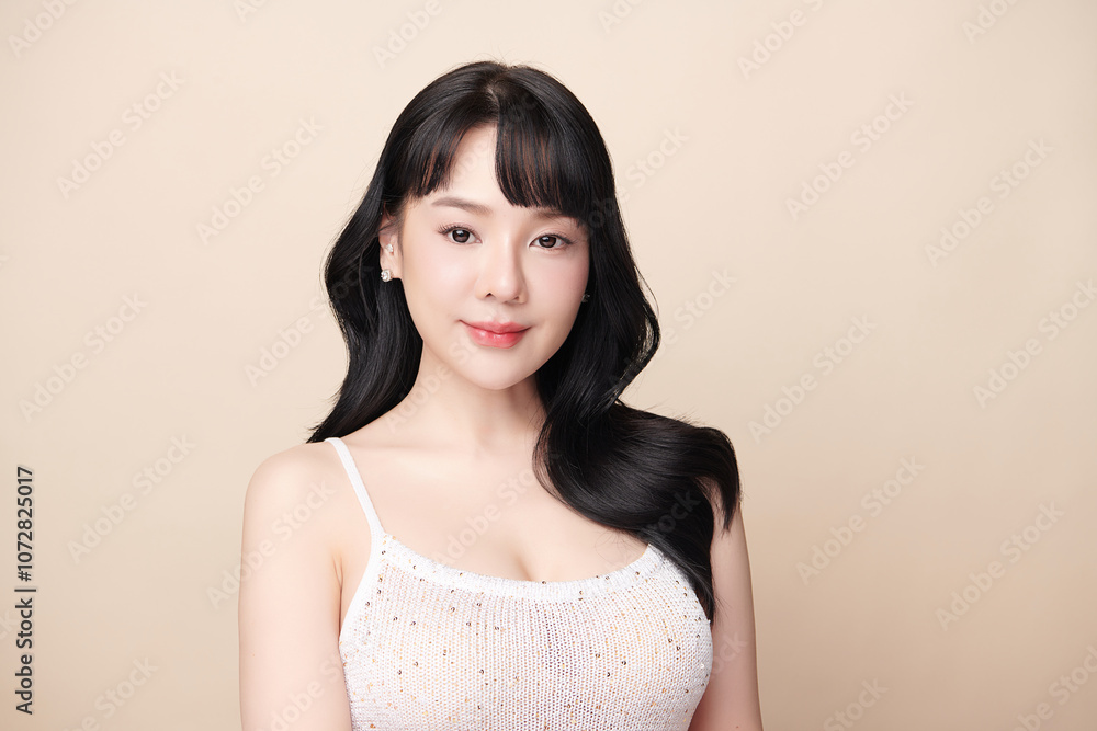 Beautiful young asian woman with clean fresh skin on beige background, Face care, Facial treatment, Cosmetology, beauty and spa, Asian women portrait. Beautiful young asian woman with clean fresh skin on beige background, Face care, Facial treatment, Cosmetology, beauty and spa, Asian women portrait.