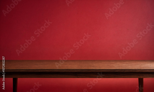 Empty wooden table with bamboo place mat over red background. Chinese New Year mock up for design and product display. photo