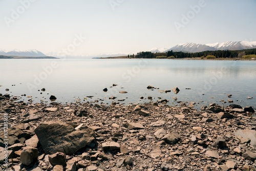 Rocky Shoreline of Lake Tekapo: Scenic New Zealand Landscape photo