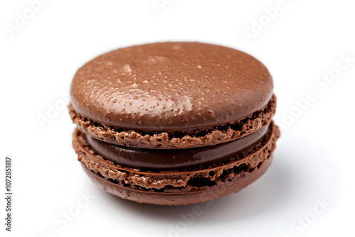 Classic chocolate macaron with smooth brown shell and rich creamy filling isolated on white