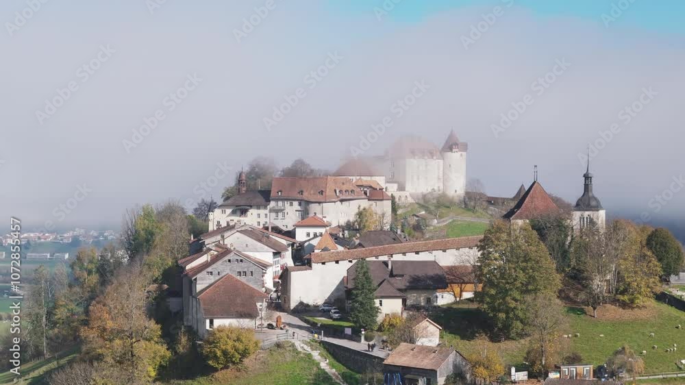 Aerial video over cloudy morning, medieval town of Gruyeres, Fribourg Aerial video over cloudy morning, medieval town of Gruyeres, Fribourg