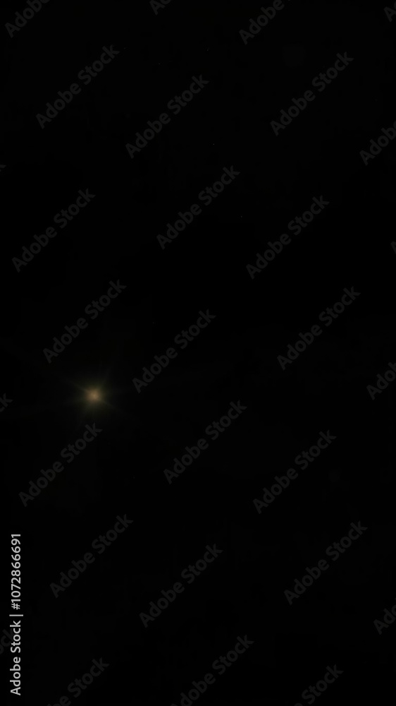 Light flare special effect in dark black background creating dramatic and atmospheric mood, blurry, abstract Light flare special effect in dark black background creating dramatic and atmospheric mood, blurry, abstract