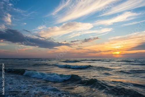 Soft golden hues fade into deep blues of a serene sunset sky with undulating waves in the ocean background, ocean waves, beachy vibes, calming view, peaceful atmosphere