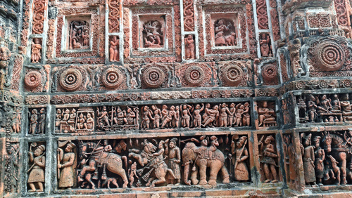 Popular terracotta art portraying hindu mythological stories on Kantajew temple in Bangladesh.Commonly known as Kantaji Temple,is a late-medieval Hindu temple. photo