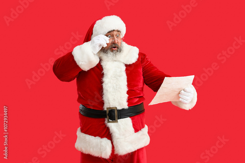 Shocked Santa Claus reading...