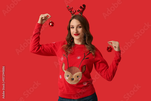 Young woman in festive rein...