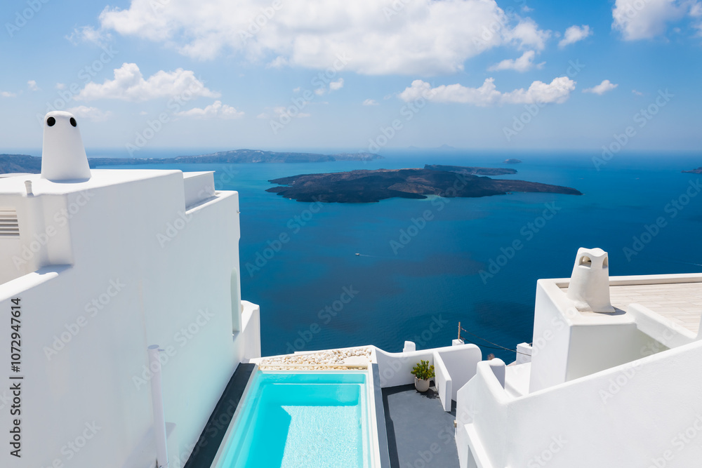 White architecture in Santorini island, Greece. Luxury swimming pool with sea view.