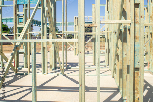 The bare wooden building frame of a house under construction.