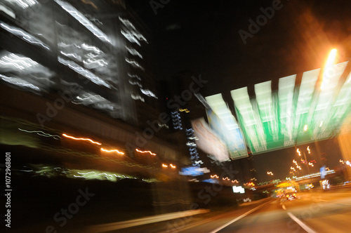 Light trails on the Shuto Expressway at night, shaky, long exposure, sign, Tokyo, Japan / 夜の首都高速道路のライトの軌跡　振れる　長時間露光　看板　東京　日本 photo