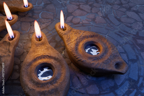 Lamps shining, reference to the parable of the ten virgins, five of whom brought extra oil. Matthew 25, teachings of Jesus. 3d rendering biblical illustration.