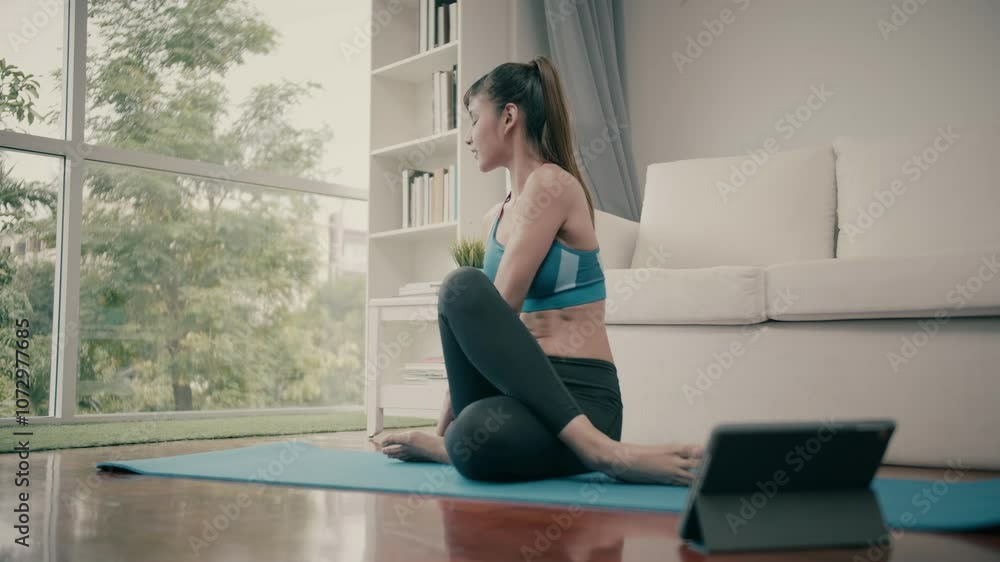 Woman doing basic exercise at home in the morning. Woman doing basic exercise at home in the morning.