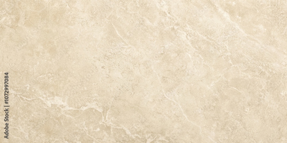 Fototapeta premium A close-up view of a smooth, textured light beige surface with subtle swirling patterns, resembling natural stone or a high-quality ceramic tile.