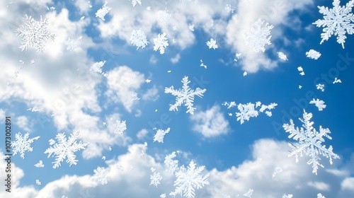 29. Low-angle view of falling snowflakes against a backdrop of winter clouds