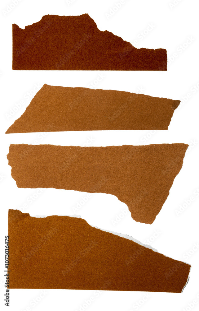 Isolated set of torn brown pieces of matte paper on white background Isolated set of torn brown pieces of matte paper on white background