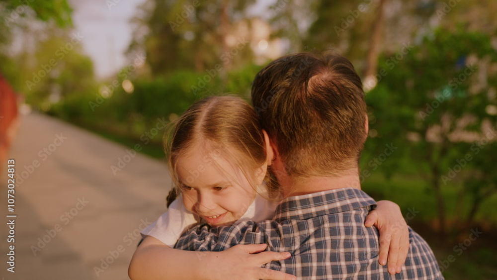happy family. dad hugs running child daughter. cheerful smiling little kid girl hugs dad by neck. happy family park. running child jumps into arms his beloved father. family happiness with child happy family. dad hugs running child daughter. cheerful smiling little kid girl hugs dad by neck. happy family park. running child jumps into arms his beloved father. family happiness with child