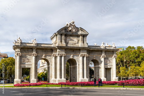 Madrid, Spain - october 10, 2024: Puerta de Alcala monument in Madrid once restored from the inclement weather in Madrid, Spain photo