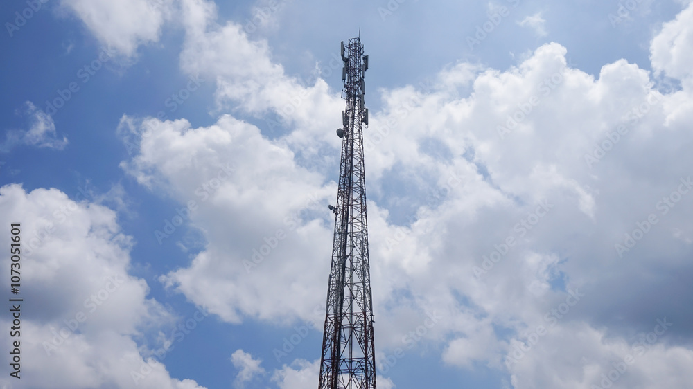 Transmitter tower with blue sky and clouds background Transmitter tower with blue sky and clouds background
