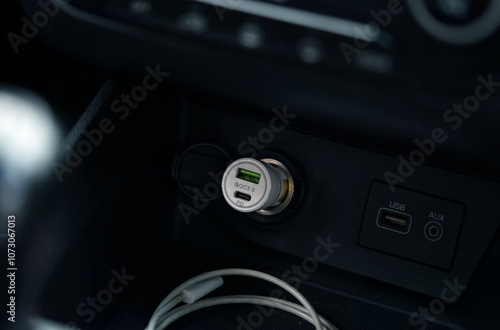 dual port mobile car charger plugged in the car
