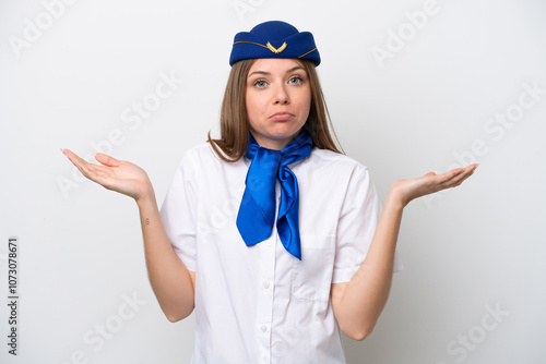 Airplane Lithuanian woman stewardess isolated on white background having doubts while raising hands