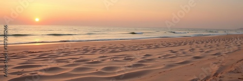 Sunset on a deserted beach with fine sand, sky, fire pit, beach ball