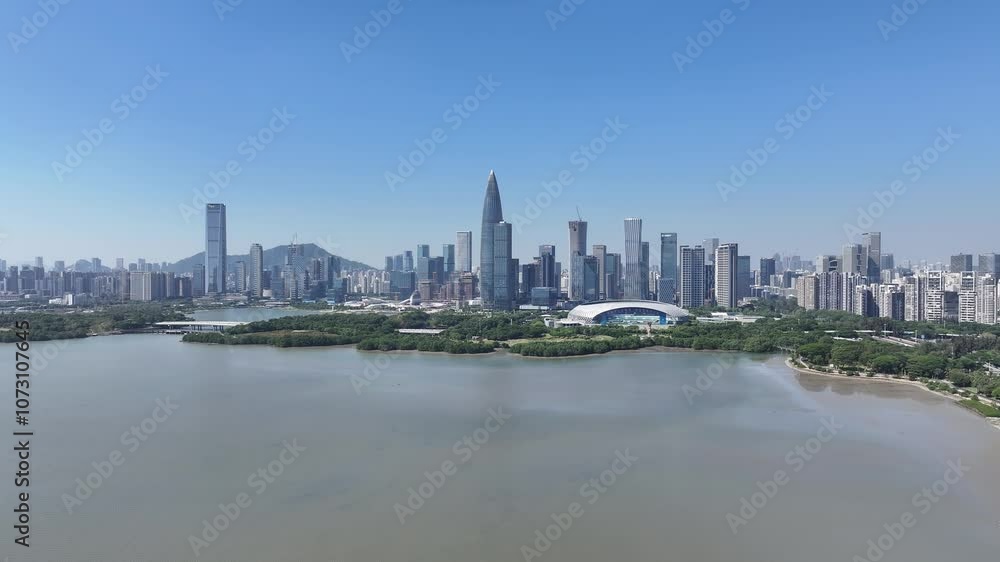 Skyview the coastal ecological landscape of China Greater Bay Area Shenzhen near Hong Kong with city rapid growth technological innovation and diverse culture showcasing a financial manufacturing hub. Skyview the coastal ecological landscape of China Greater Bay Area Shenzhen near Hong Kong with city rapid growth technological innovation and diverse culture showcasing a financial manufacturing hub.