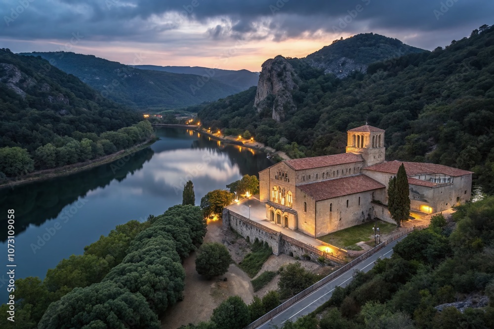 Fototapeta premium Serene Long Exposure of a Cistercian Abbey Nestled in the Corbieres Mountains at Dusk, Showcasing Tranquil Reflections and Mystical Atmosphere of Ancient Architecture