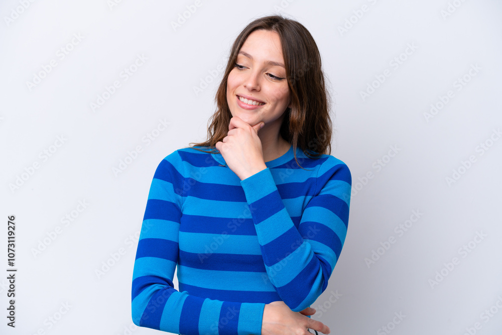 Young caucasian woman isolated on white background looking to the side and smiling Young caucasian woman isolated on white background looking to the side and smiling