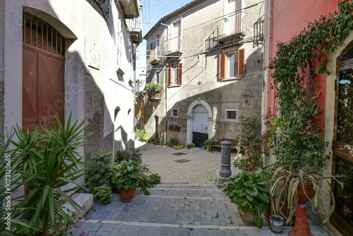 A road between the old houses of Sepino, a village in Molise, Italy. photo