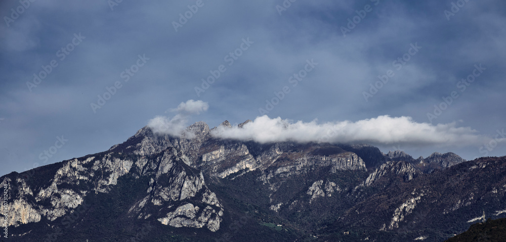 Clouds on the horizon near mountains Clouds on the horizon near mountains