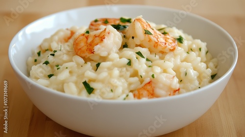 Creamy shrimp risotto garnished with parsley, showcasing a rich, comforting dish ideal for any seafood lover. photo