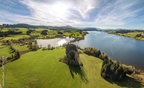 aerial landscape photo of with Lake Rottachspeicher between pastures and colorful autumn forests in the upper Allgaeu in Petersthal, next to Kempten Kempten photo