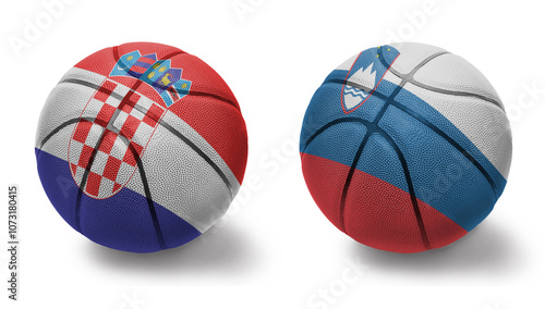 basketball balls with the national flags of slovenia and croatia on the white background. photo