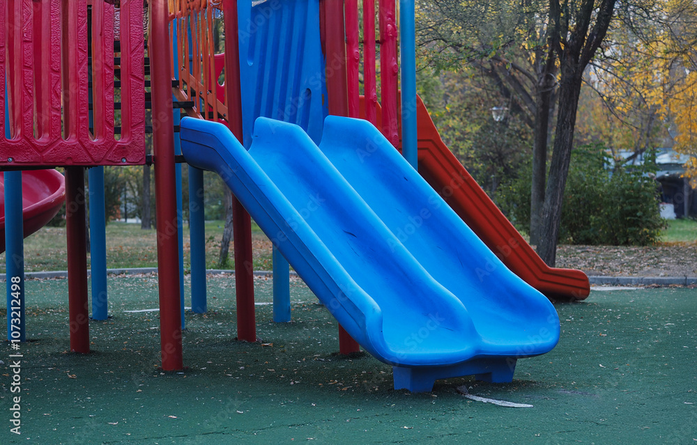 Equipment in the playground. Slides, swings, seesaws Equipment in the playground. Slides, swings, seesaws