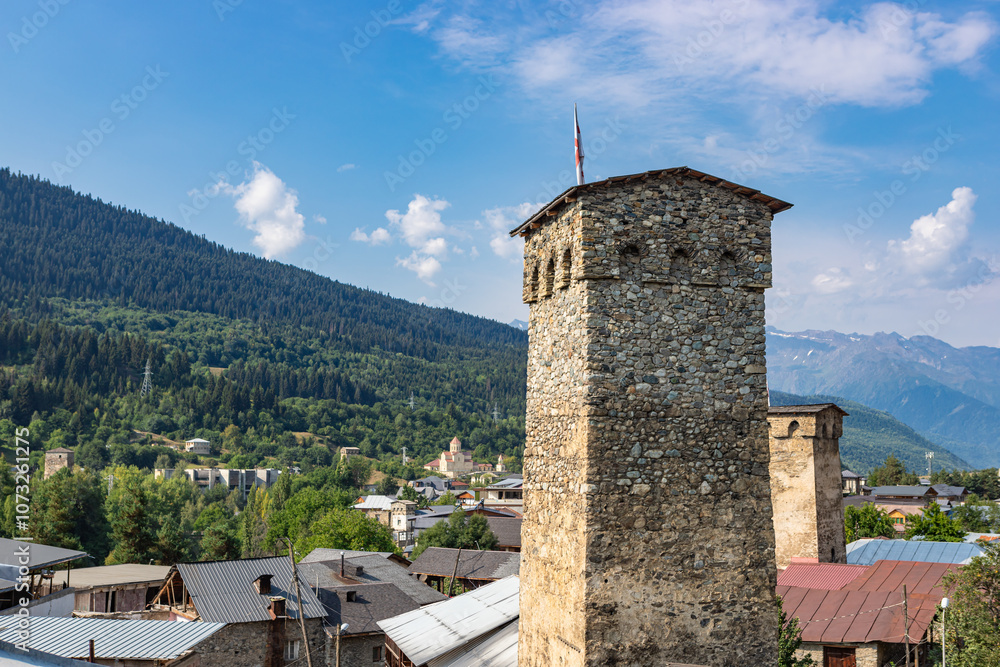 Mestia town in Georgia. The medieval Svan Towers is a traditional fortified residence in Mestia, Georgia. Svan towers and structures surrounded by green colors.