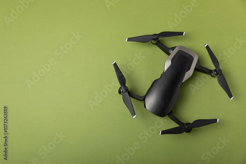 Drone unmanned aircraft on textured background. Modern FPV drone on background. The drone quadcopter. aircraft on the radio control. Drone for racing, filming and entertainment. photo