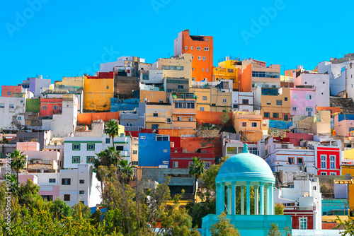 Obraz na płótnie Colorful houses of Las Palmas from Gran Canaria, Canary Islands. Vibrant, multi-colored building showcasing a mix of bright hues and unique architectural design w salonie