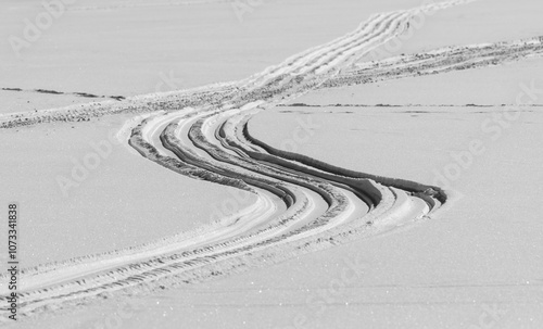 snowmobile tracks on a snow field