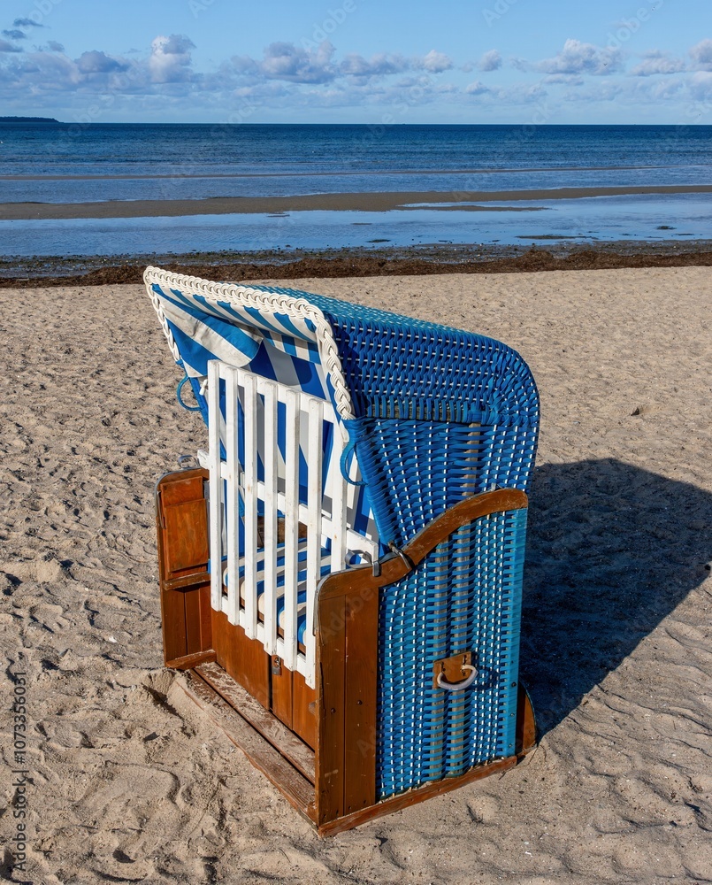 Beautiful beach chair for relaxing on the beach of the Baltic Sea