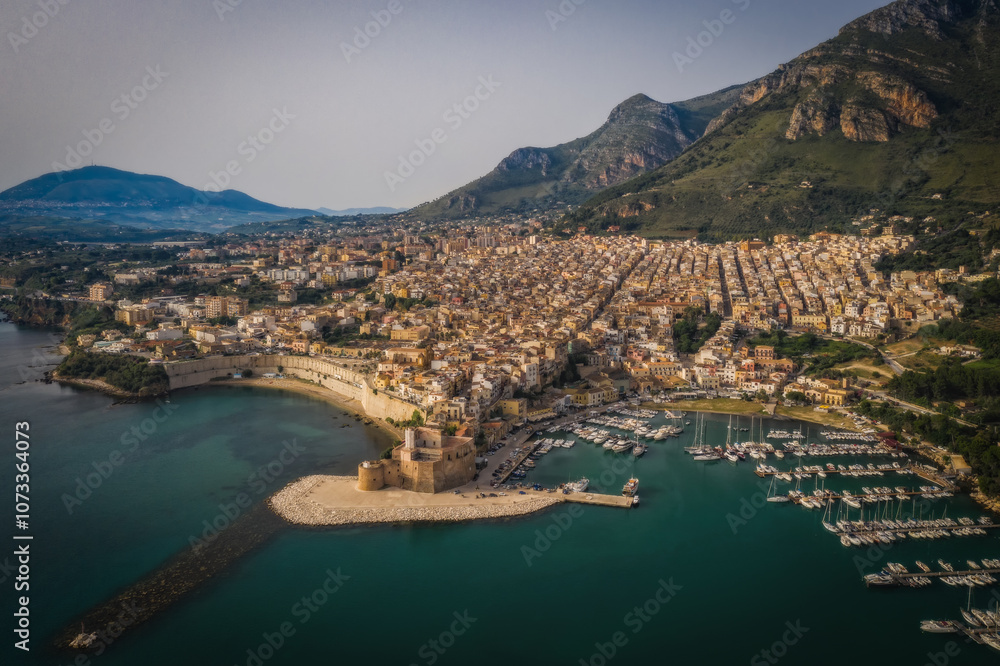 Fototapeta premium Castellammare del Golfo, Sicily, Italy. June 2023, sunny early morning. Aerial drone picture.
