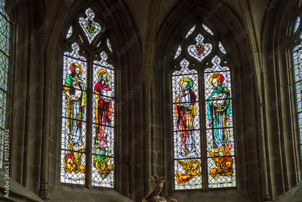 Detail of the stained glass windows in the church of Vire in Normandy, France Detail of the stained glass windows in the church of Vire in Normandy, France
