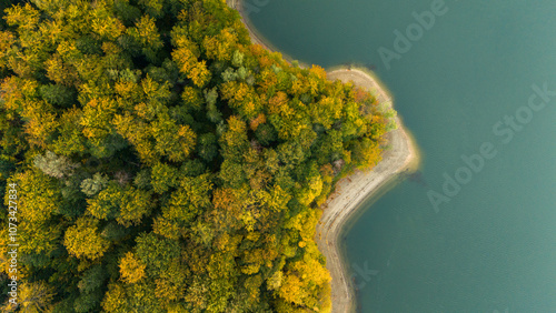 Fototapeta Naklejka Na Ścianę i Meble -  Fall Colors of Solina Lake and Bieszczady Mountains in Stunning Drone View