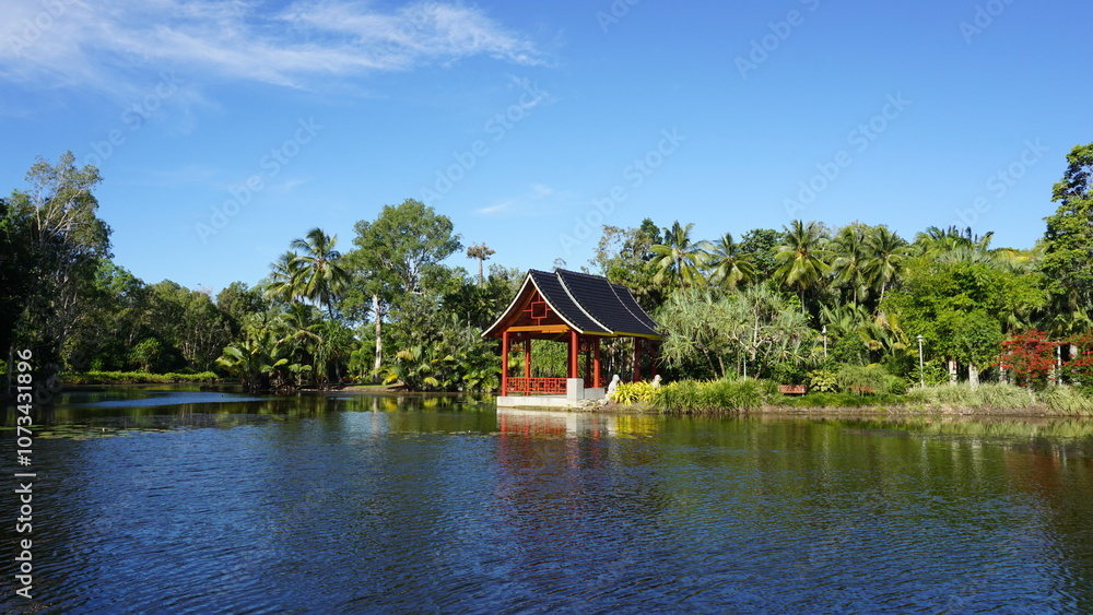 Cairns Botanical garden building at the lake in the tropics Cairns Botanical garden building at the lake in the tropics