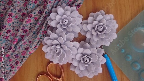 Delicate Handmade Fabric Flowers Crafted for DIY Projects.  photo