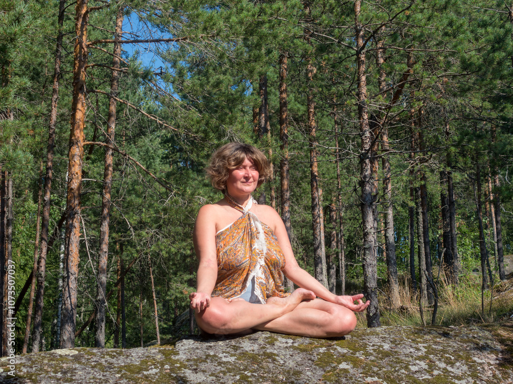 Fototapeta premium woman sitting in yoga pose