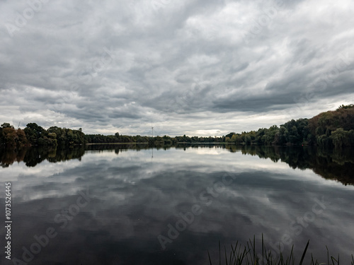 Dark clouds at the lake photo