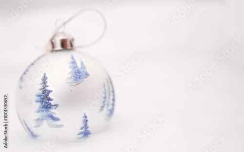 blue christmas ball with snow