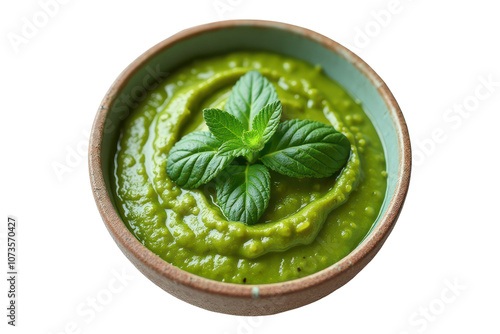 Mint chutney isolated on a transparent background. Green spicy Indian sauce.  photo